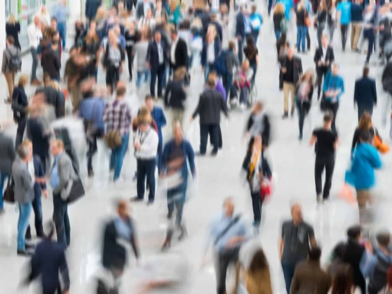 blurred people in a modern hall