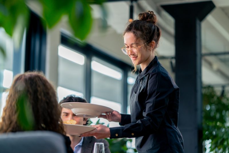 A,Girl,Waiter,Serves,Orders,To,Guests,The,Concept,Of