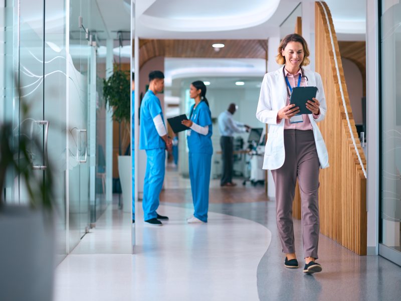 Female,Doctor,In,White,Coat,With,Digital,Tablet,In,Hospital