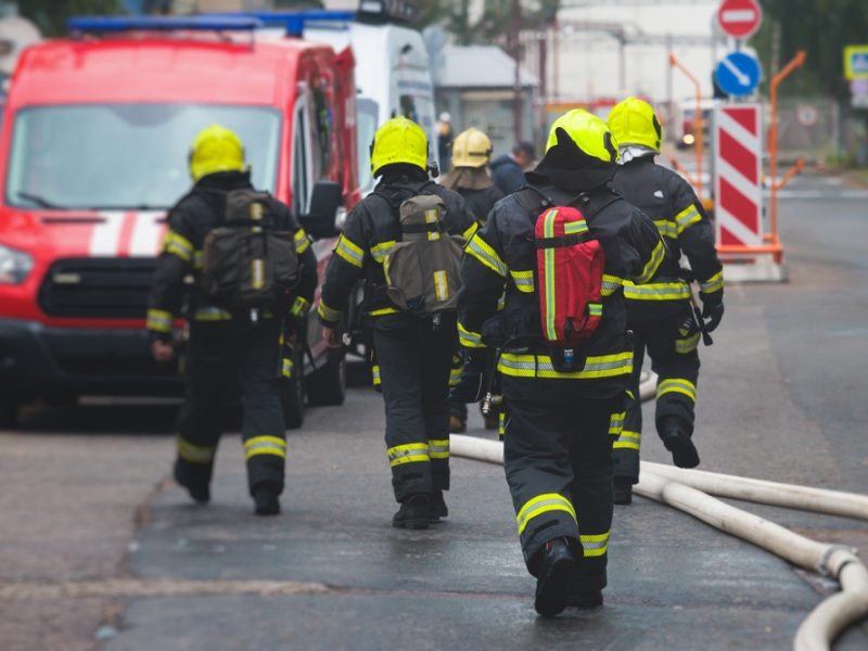 Group,Of,Fire,Men,In,Protective,Uniform,During,Fire,Fighting