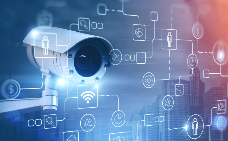 Street,Camera,For,Surveillance,And,Business,Icons,Over,Cityscape,Background.