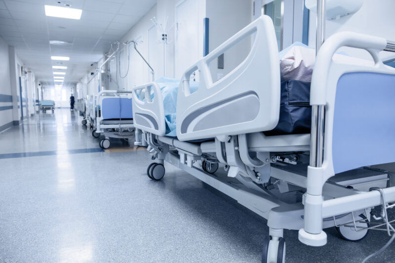 Long,Corridor,In,Hospital,With,Surgical,Transport.,Tinted,Picture