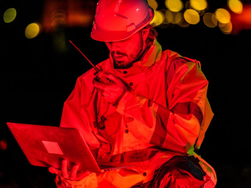 Safety,Officer,Communicating,With,Rescue,Team,Via,Radio,During,Crisis.