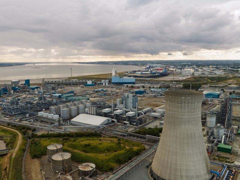 Massive,Industrial,Chemical,Manufacturing,Plant,With,Tall,Cooling,Towers,And